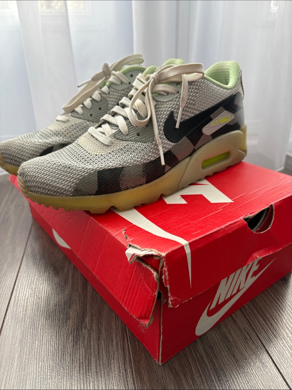 Nike Air Max sneakers in gray with neon green accents